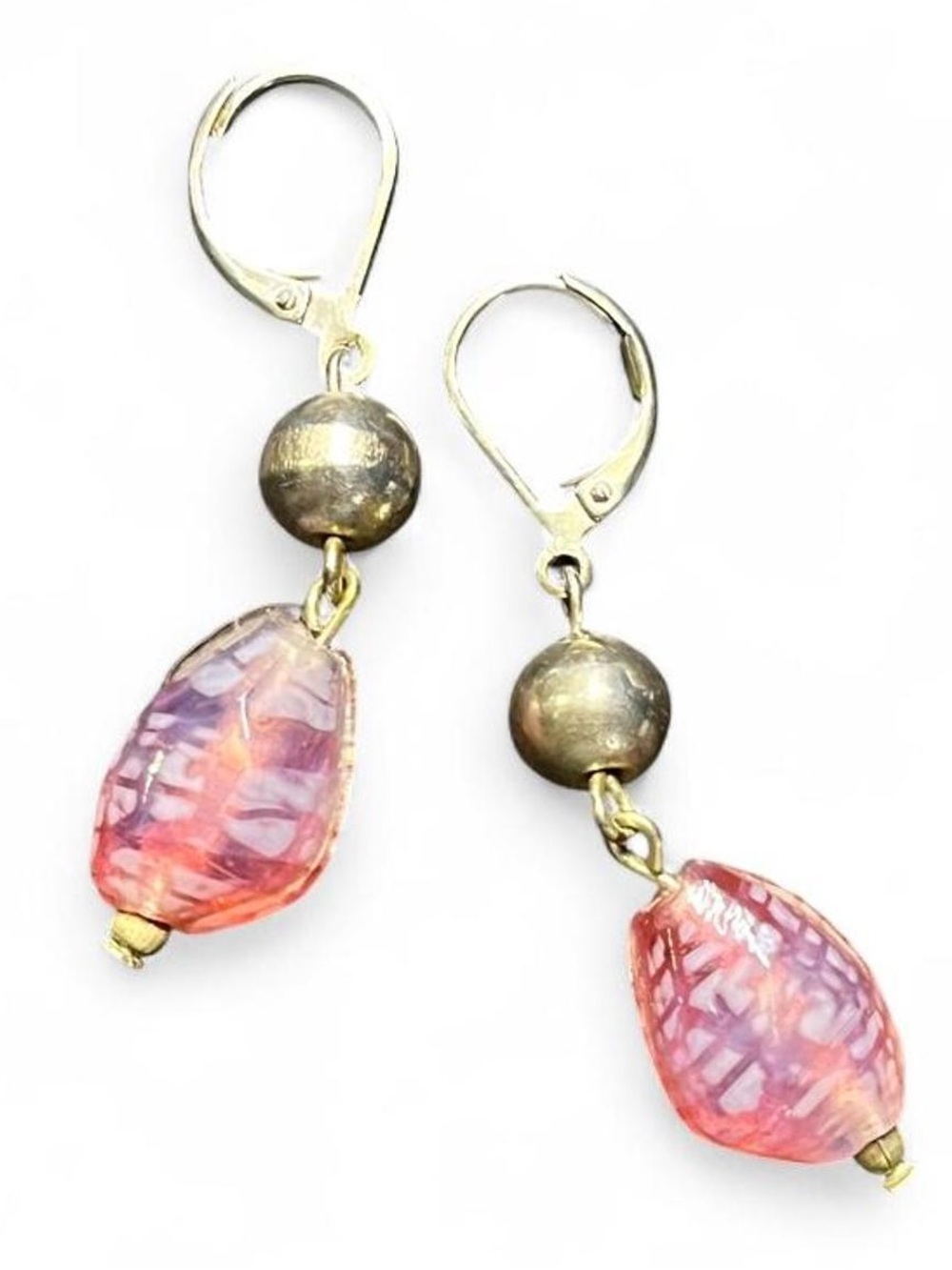 Silver earrings with pink dangling stones